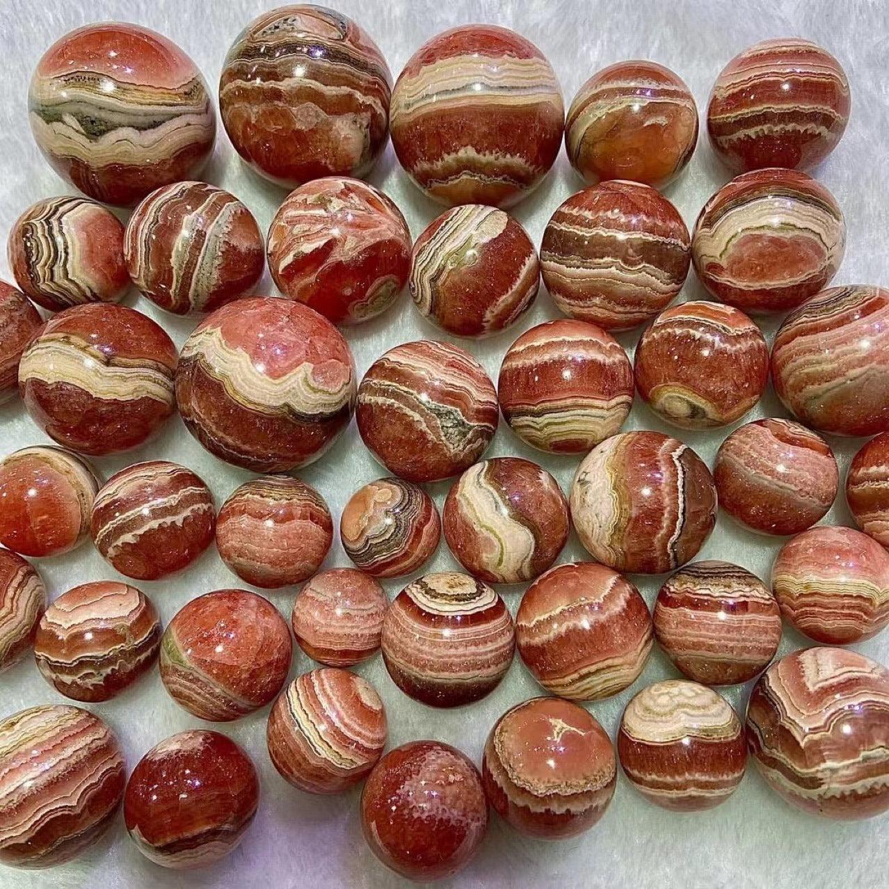 3-5cm Rhodochrosite sphere 1kg