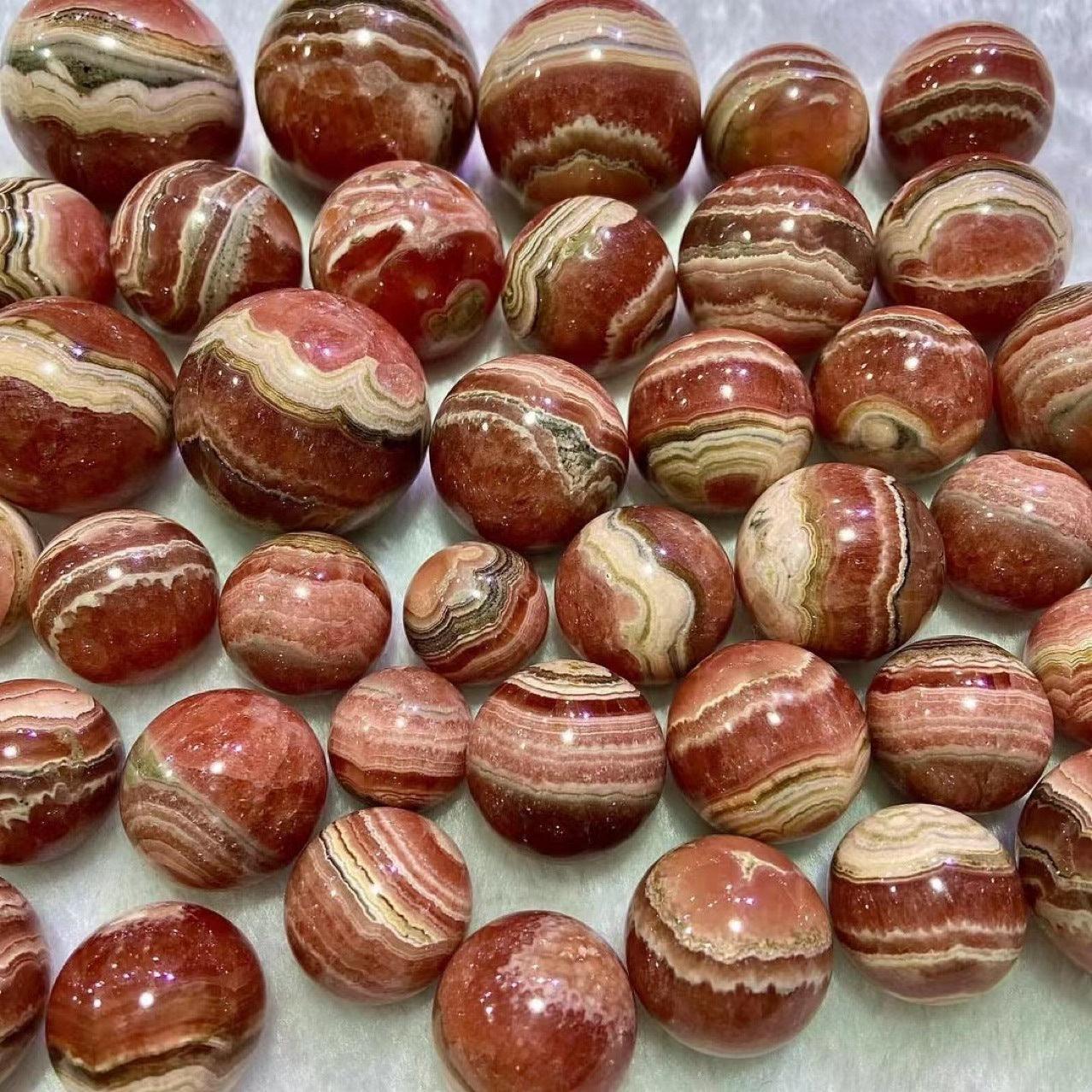 3-5cm Rhodochrosite sphere 1kg