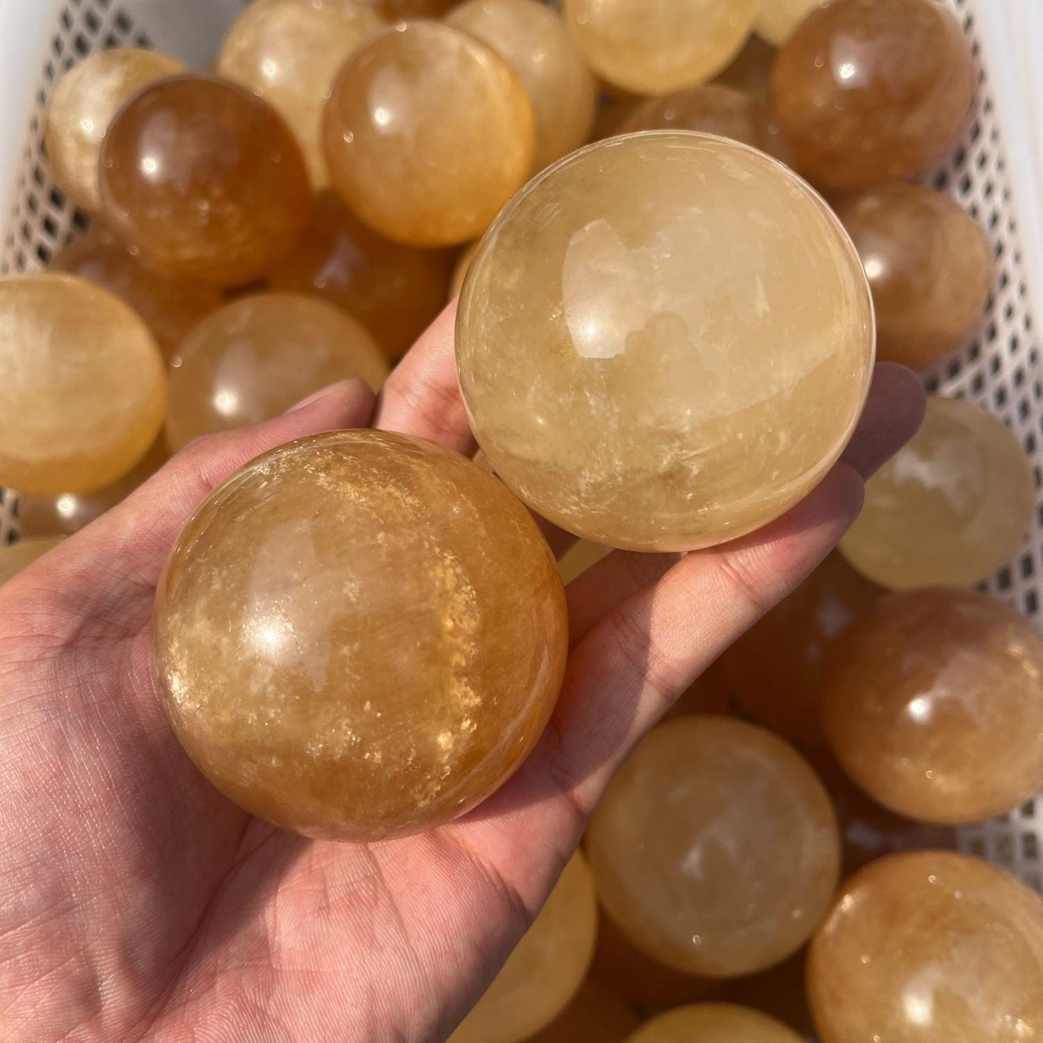 5-7cm yellow calcite sphere Wholesale - Free Shipping Over 300USD - Price at $ 14.00 /pc