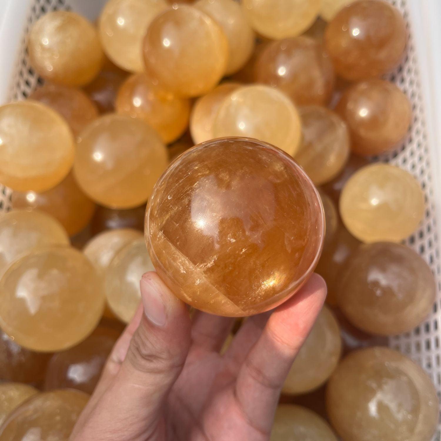 5-7cm yellow calcite sphere Wholesale - Free Shipping Over 300USD - Price at $ 14.00 /pc