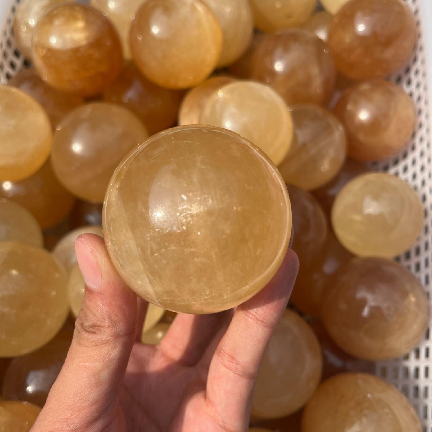 5-7cm yellow calcite sphere Wholesale - Free Shipping Over 300USD - Price at $ 14.00 /pc