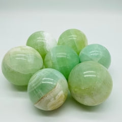 3-6CM green calcite sphere