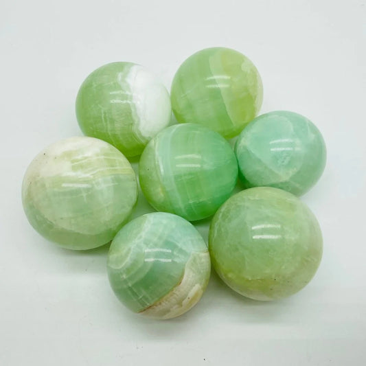 3-6CM green calcite sphere