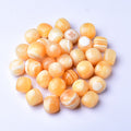 2-3cm honey calcite tumbled 1kg