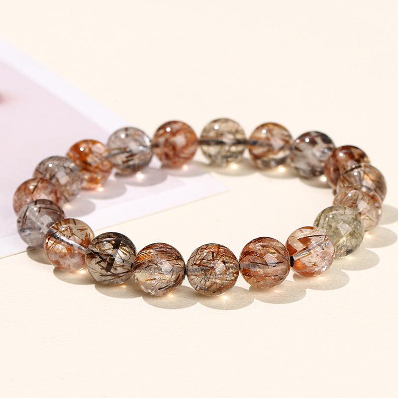 black gold super 7 bracelet by MLD Wholesale Crystals round translucent beads with rutilated inclusions