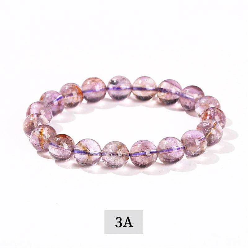 MLD Wholesale Crystals wholesale amethyst bracelet round polished translucent purple beads with natural inclusions on stretch cord