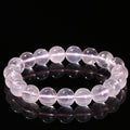 MLD Wholesale Crystals wholesale rose quartz star bracelet round polished beads stretch on black background