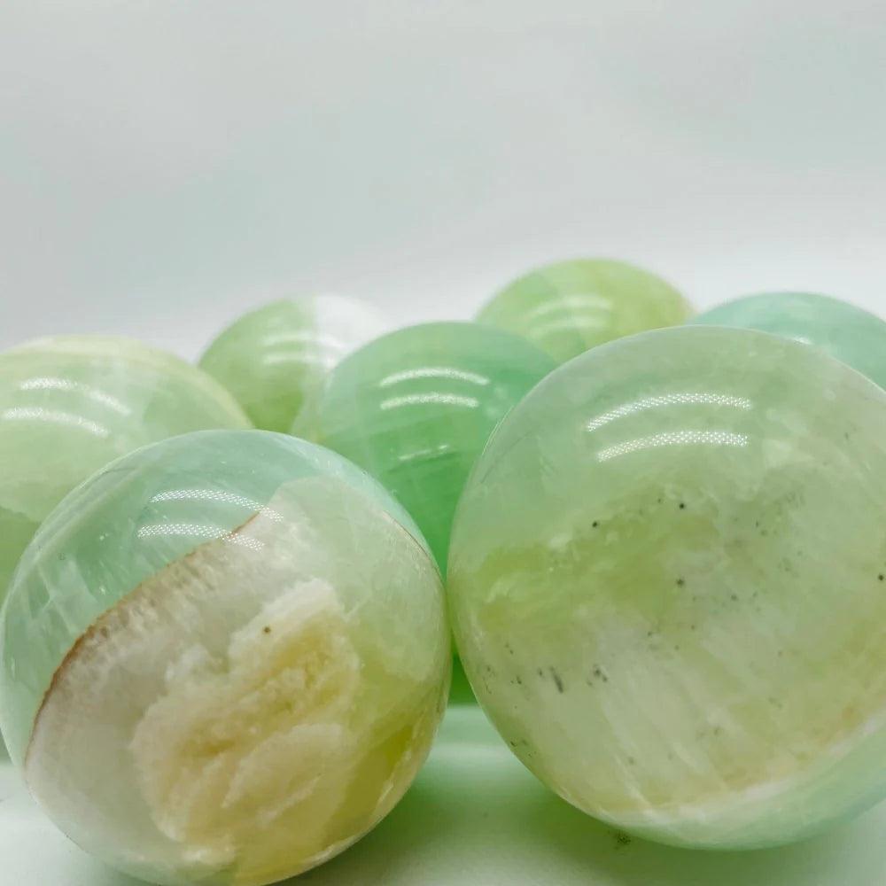 3-6CM green calcite sphere