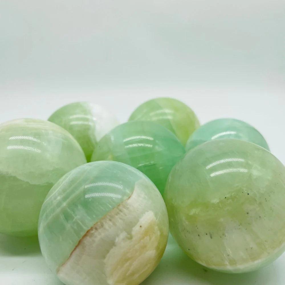 3-6CM green calcite sphere