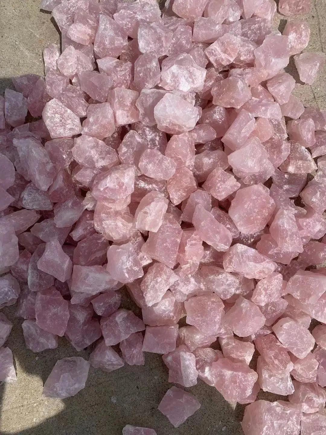MLD Wholesale Crystals pile of loose pink rough chunks wholesale rose quartz raw stones for decor and jewelry