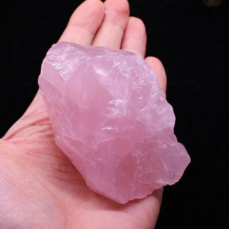 MLD Wholesale Crystals hand holding large pale pink wholesale rose quartz raw stones chunk ideal for decor