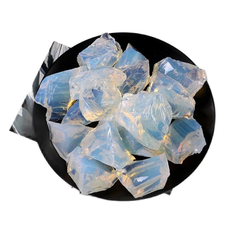 MLD Wholesale Crystals wholesale rose quartz raw stones opalescent translucent raw chunks on black plate