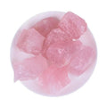 MLD Wholesale Crystals wholesale rose quartz raw stones displayed as pale pink rough crystal chunks in a white bowl