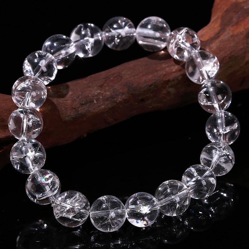 Azeztulite bracelet wholesale clear round crystal bead stretch bracelet with internal fractures on dark background